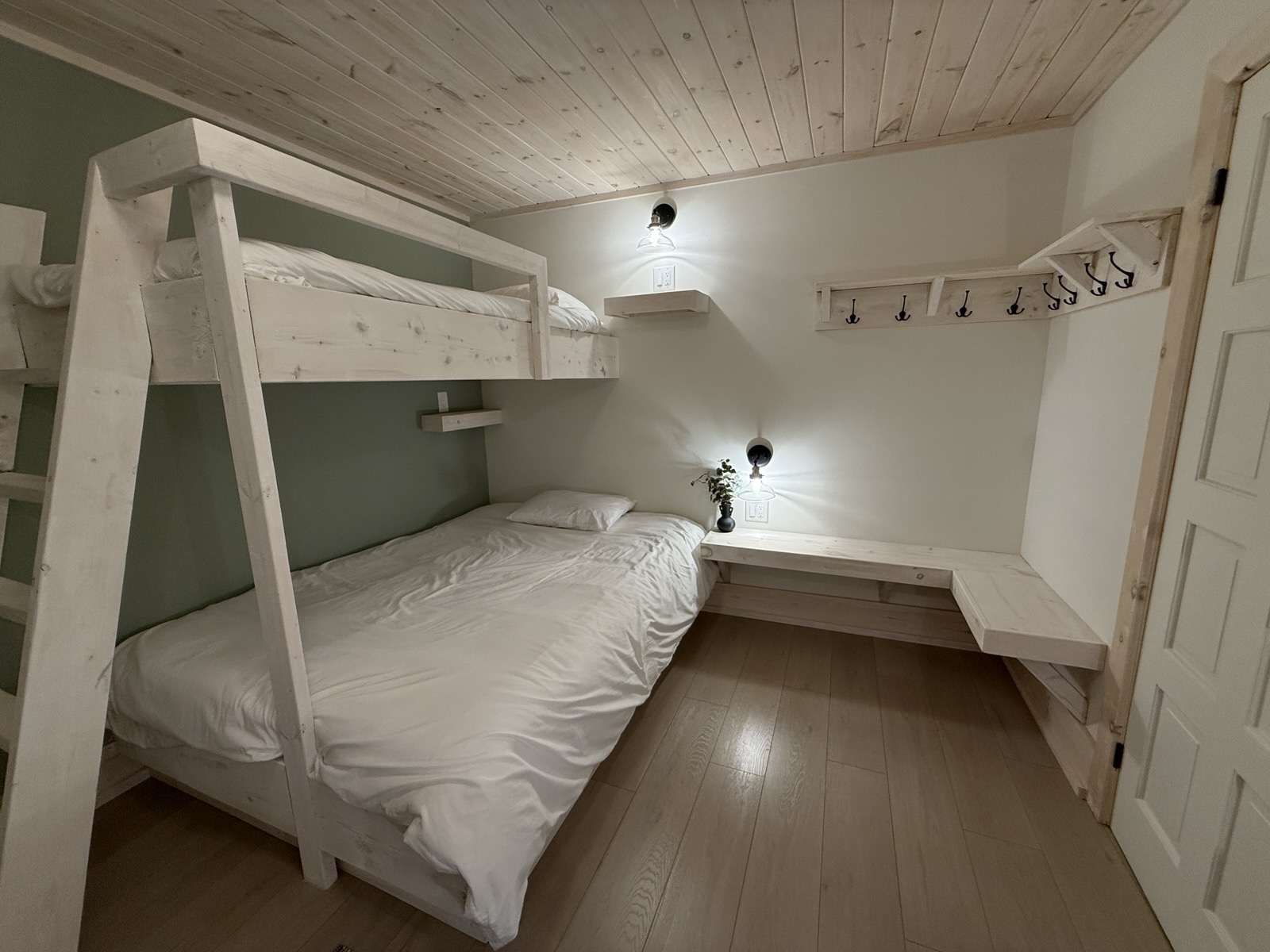 The bunk room with built-in bunks and ladders